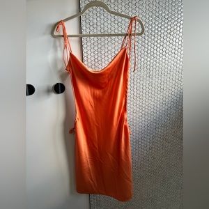 Lightweight strappy satin mini dress. Perfect for beach or a night out.